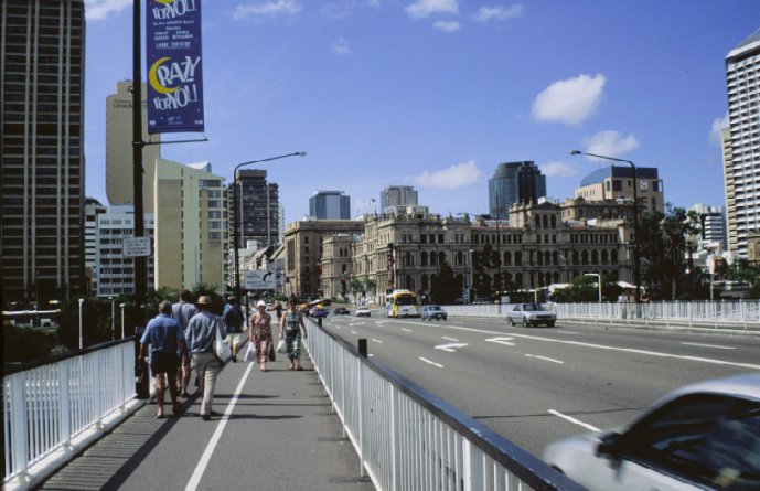 Crossing the bridge from the convention center to downtown Brisbane.The building on the right, after the bridge is the Casino, and of course people are driving on the left.