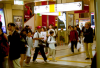 People walking or waiting in Yokohama Station