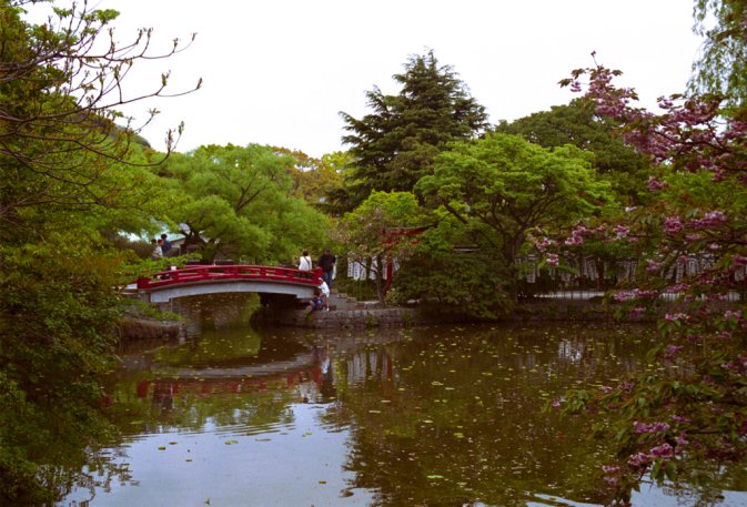 The lake around a small shrine, with a bridge, in a big temple place, near Kamakura station, I don't remember the name...